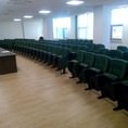 Кресла для аудиторий Robustino Luxe RL-01 в конференц-зале на 100 мест